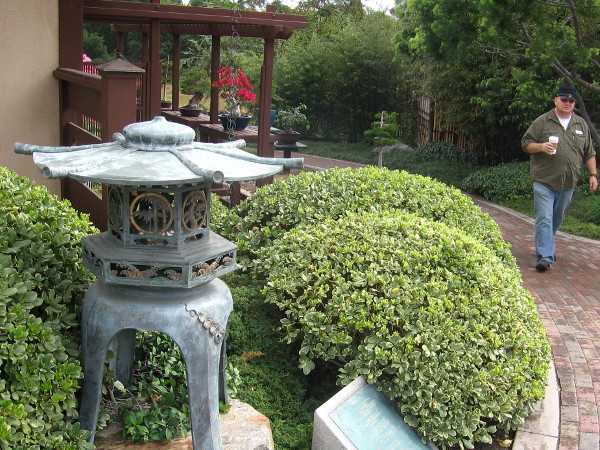 Walking down a path through a scene of carefully maintained beauty.