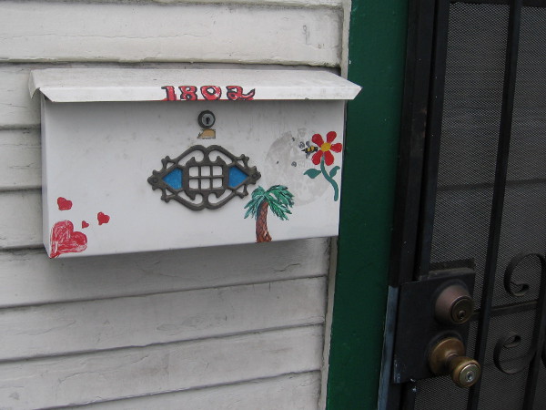 Just a fun mailbox with hearts, flower and palm tree.