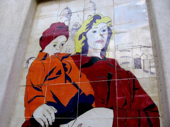 A closer examination of the mother and child tile mural in Little Italy.
