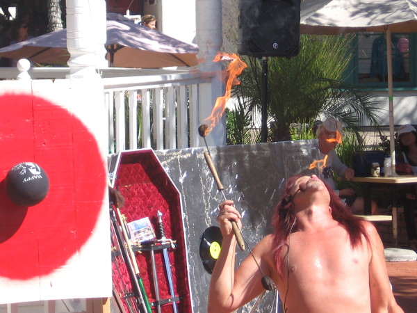 Fire eating preceded balancing on a sword, being crushed on a bed of nails, and shooting a flaming arrow from his throat!