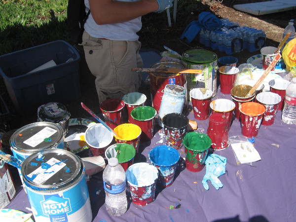 Lots of paint cans contain the colors of wildlife and river scenery.