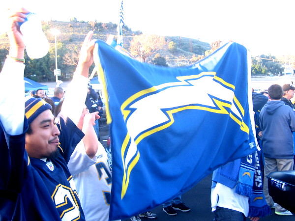 Legions of local football fans waved banners of blue and gold.