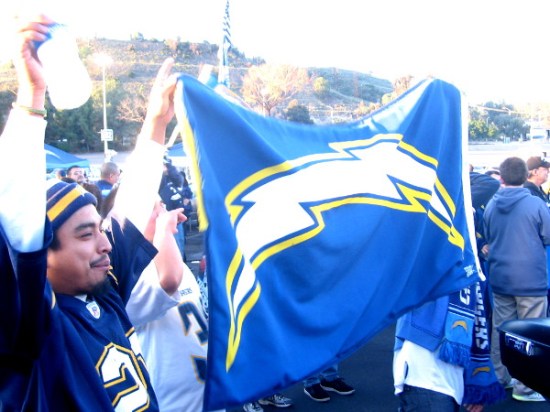 Legions of local football fans waved banners of blue and gold.