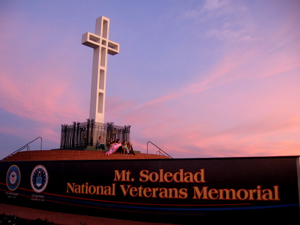 Tinted morning sky above Mt. Soledad National Veterans Memorial in San Diego.