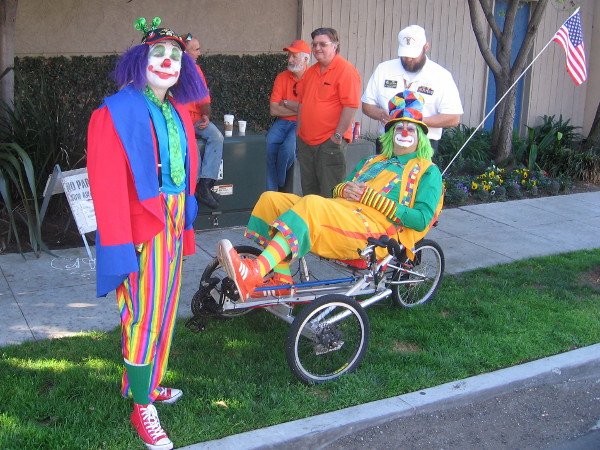 These clowns are relaxing in the shade as a sunny San Diego day heats up.