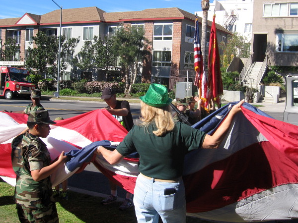 The Young Marines were folding a large American flag as I walked down Sixth Avenue.