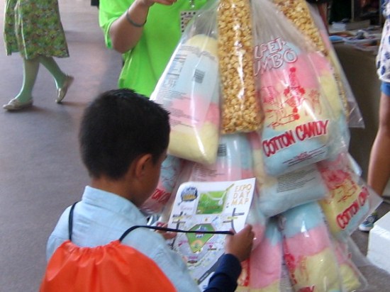 This kid is way more interested in a map to cool science stuff than boring bags of cotton candy!