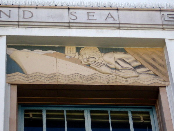 Ship cuts through ocean waves on its way to deliver the mail.