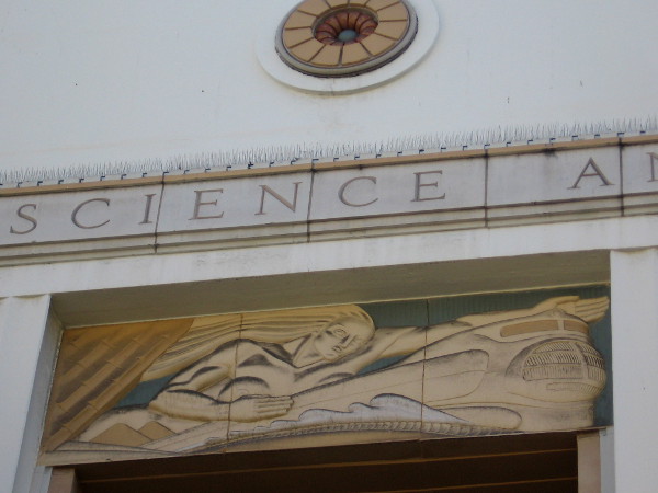 Distinctive Art Deco train can be seen near roof of San Diego's old Post Office.