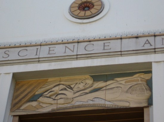 Distinctive Art Deco train can be seen near roof of San Diego's old Post Office.
