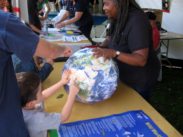 A member of the next generation lays his hands on our planet.