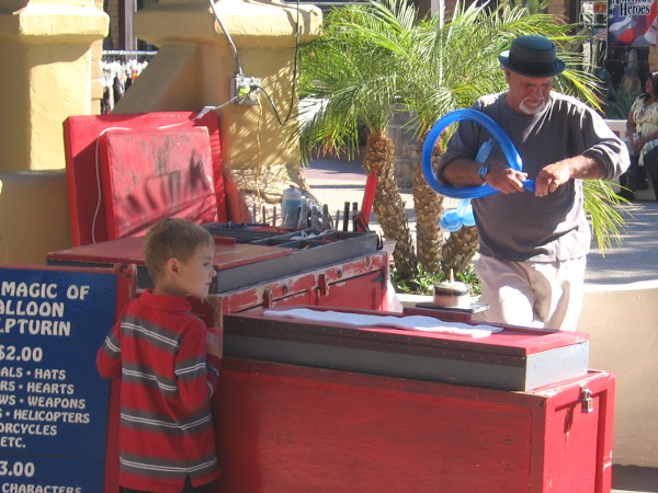 Carefree, easy fun at every turn. These guys are by the Seaport Village carousel.