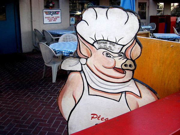 This Kansas City Barbeque pig is a Top Gun chef. I bet he likes to ham it up.