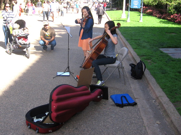 Young ladies perform classical music in Balboa Park to help raise money for a very worthy cause!