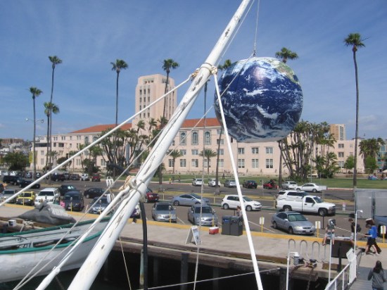 Our big blue marble Earth dangles in the sky on San Diego's Embarcadero for an Earth Day event.