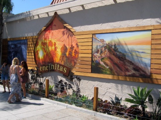 Colorful murals along the sidewalk in this happy, carefree beach town.