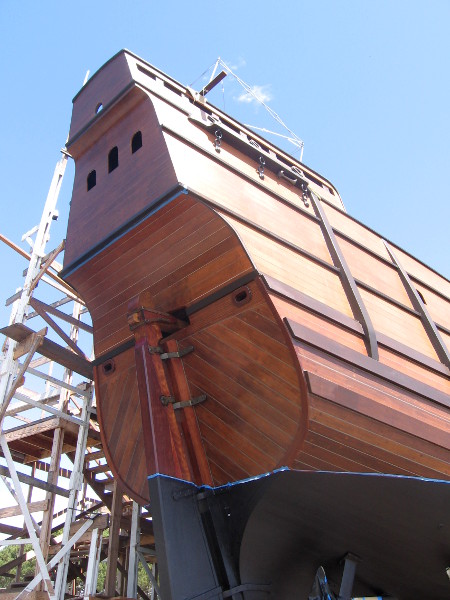 The high stern of San Salvador. The rudder is attached to a tiller. That propeller below (and eventual engine) is a modern convenience, unknown by Cabrillo!