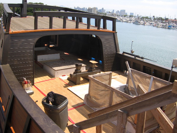 View of the San Salvador galleon while standing atop the aftcastle. Work to finish the vessel's deck and interior is underway.
