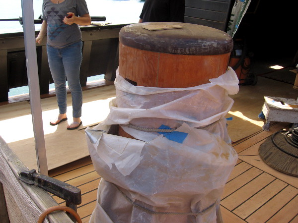 Capstan is a vertical timber that projects through the deck. Bars will be inserted and used by sailors to turn the capstan, hauling ropes or chains.