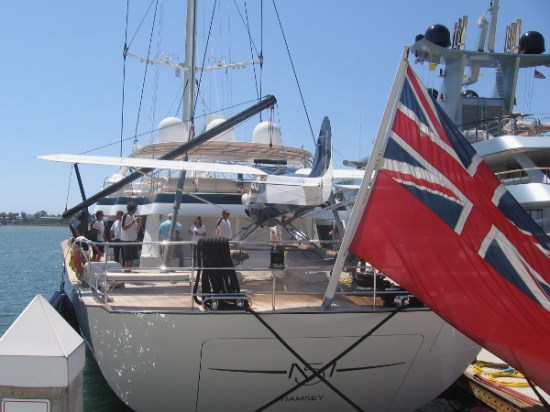 The plane is secured to the rear deck of the amazing M5 yacht.