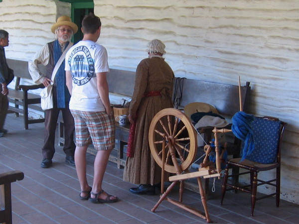 State Park volunteers describe life in early San Diego, when spinning wheels were common household objects.