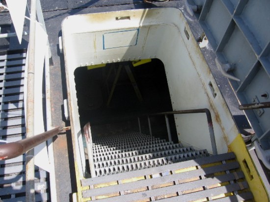 This forward hatch (and the rear one) were cut into the hull so museum visitors could easily walk through the sub's length. Originally there was one hatch, at the sail.