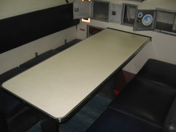 This dining table was constantly in use. Not much to see in the way of decor.