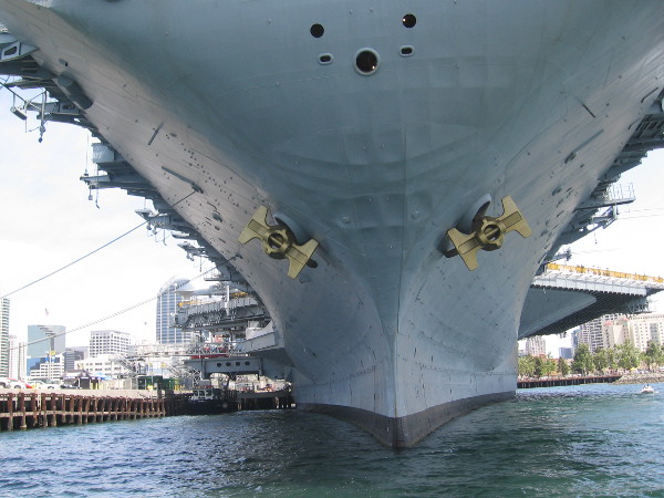 We pass under the immense bow of the USS Midway aircraft carrier, which is also a super popular and fascinating museum.