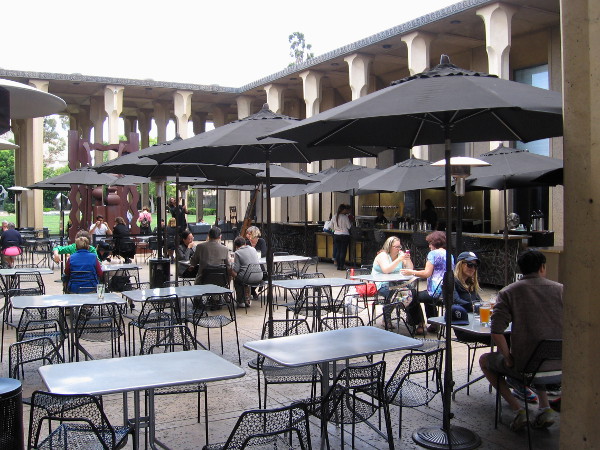 Diners enjoy Panama 66 food and refreshment in the cool Sculpture Court of the San Diego Museum of Art.