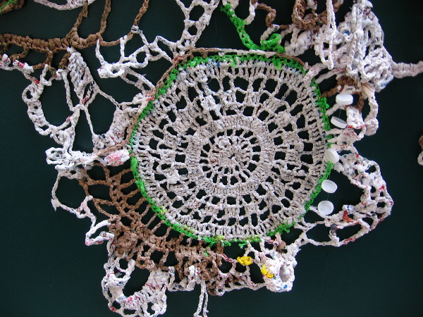 Close look at beautiful plarn artwork exhibited on lower level of downtown San Diego's Horton Plaza.