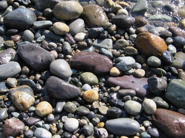 These stones were made smooth and rounded by that great Earth-encompassing rock tumbler, the mighty ocean!