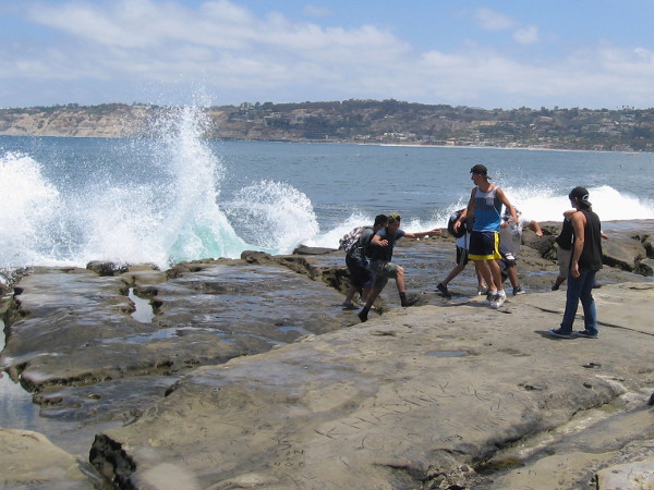 An unexpected wave crashes in. Scatter!