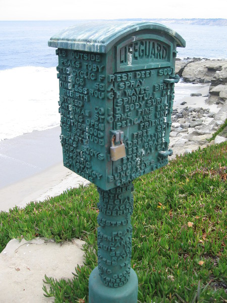 This cool lifeguard box is sculpted with many beach related words.