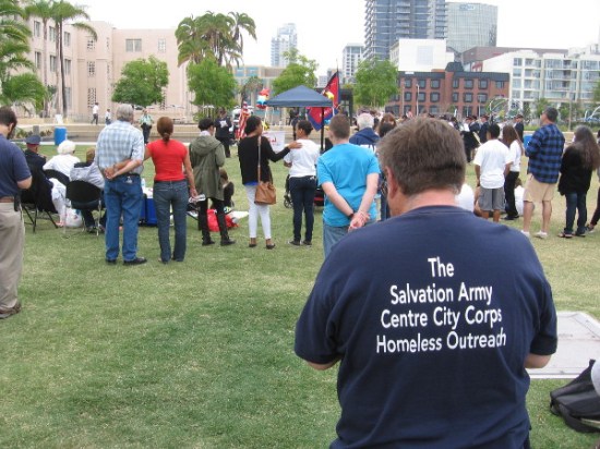 A speech kicks off the event. The Salvation Army helps the homeless, the poor, the suffering around the world.