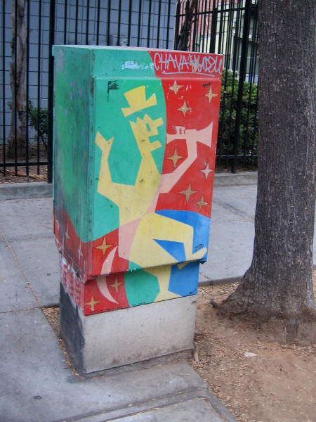 Happy reveler painted at the corner of Seventh and E Street.