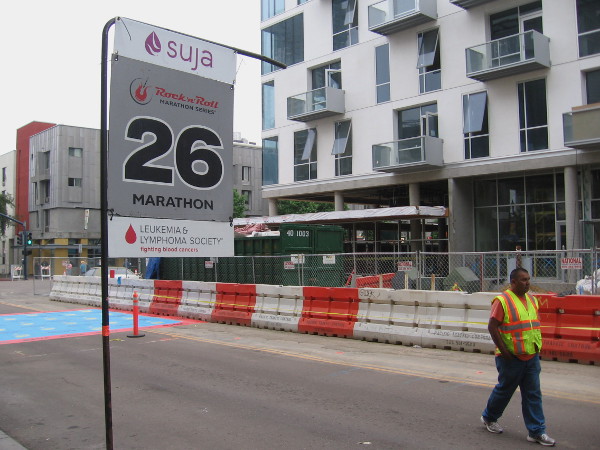 Less than a mile from the finish line, no runners have arrived yet.