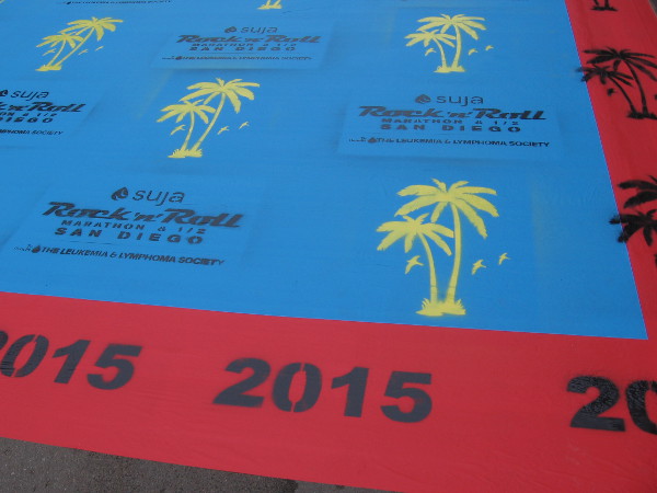 The runners will be crossing this cool Rock 'n Roll Marathon graphic on 13th Avenue.