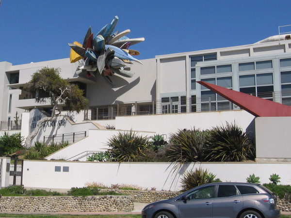 Sculpture at the rear of La Jolla's Museum of Contemporary Art San Diego called Pleasure Point is made of rowboats, canoes, jet skies, and surfboards.