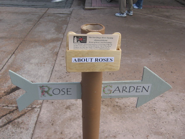 Sign shows the way to the Rose Garden across Park Boulevard.