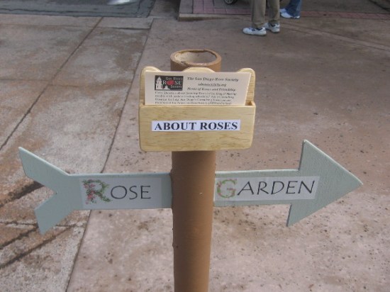 Sign shows the way to the Rose Garden across Park Boulevard.