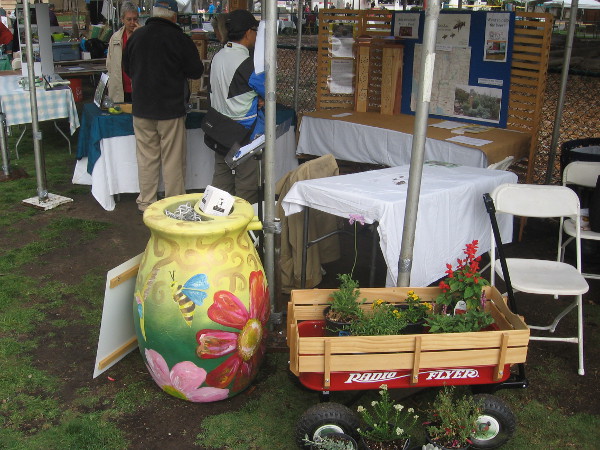 Another exhibitor near the Moreton Bay Fig Tree and Natural History Museum has a cool trash can painted with flowers and a bee.