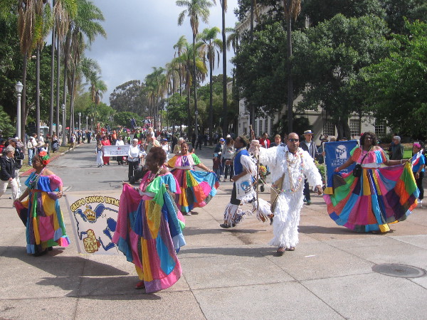 Look at the boldly colored dresses and fantastic costumes!