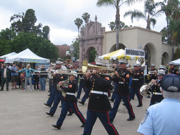 The band leads the way as marchers from the Marine Corps Recruit Depot enter Plaza de Panama.