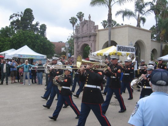 The band leads the way as marchers from the Marine Corps Recruit Depot enter Plaza de Panama.
