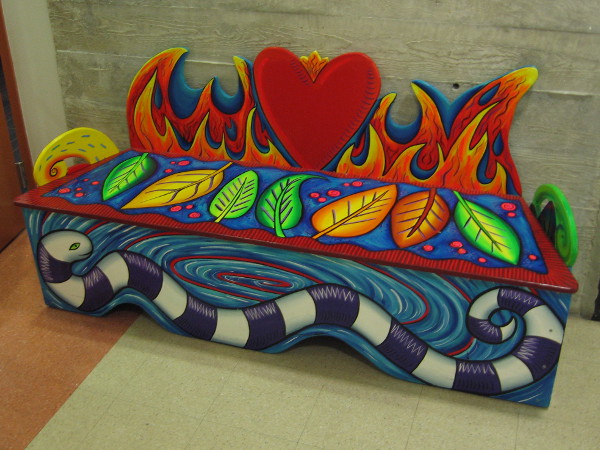One of several colorful benches inside Building 202, home to small museums and galleries.