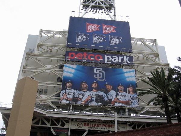 Seventh Avenue has turned into Tony Gwynn Drive. With the new Padres baseball season, brand new graphics have appeared on the sign behind Petco Park’s big videoboard.