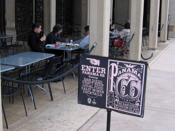 Sign directs people to Panama 66 in Balboa Park.