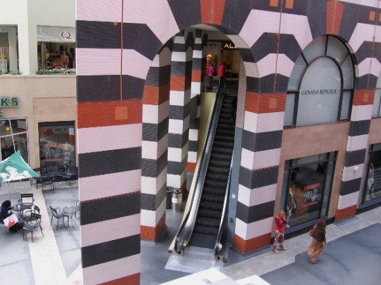 This escalator goes up one level, but no escalator goes down right here!