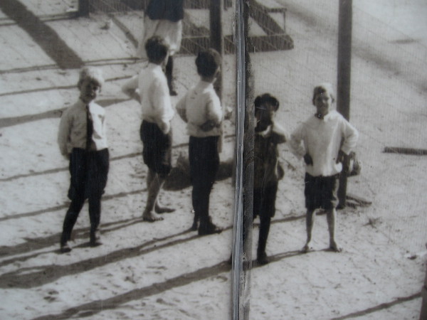 Second panel of photo mural shows kids in the Rose Park Playground at Eleventh and Island in 1915.