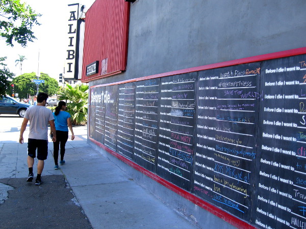 People walk toward Alibi as they review reasons for living.